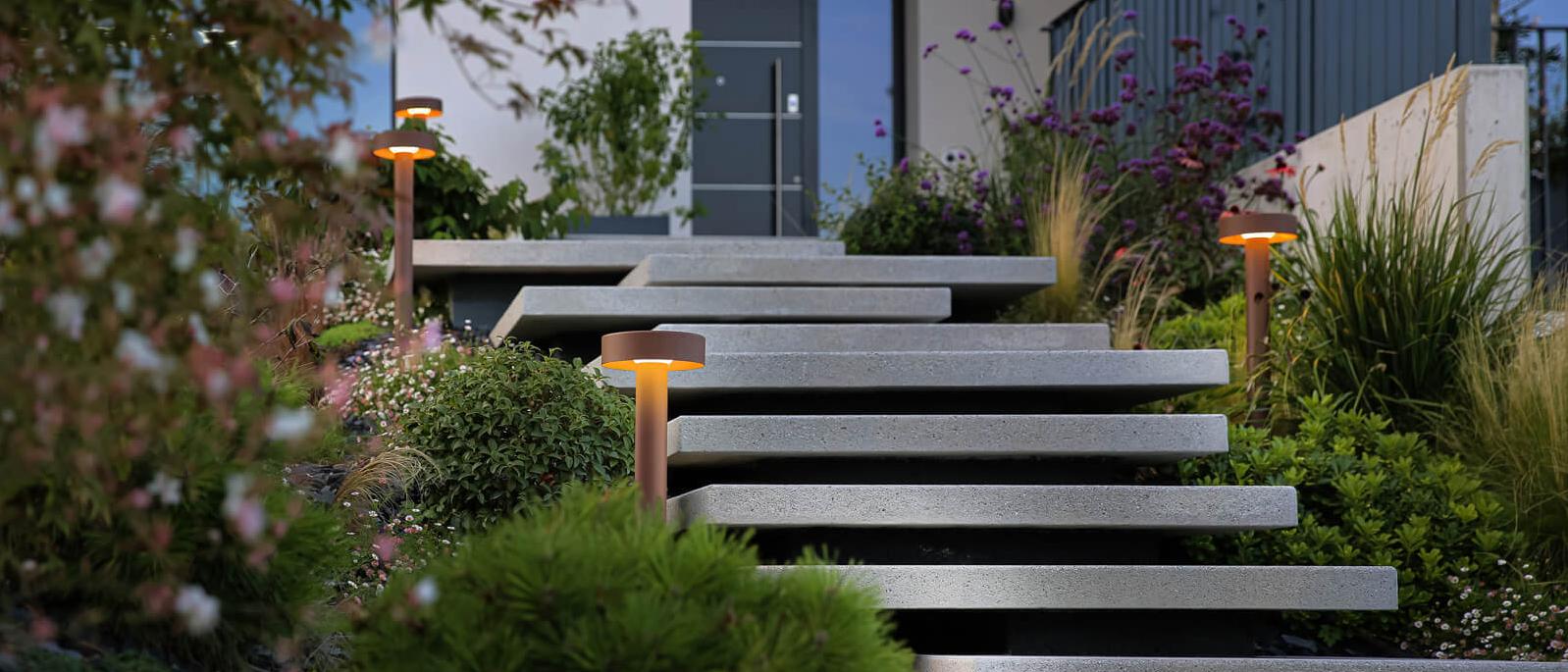 Outdoor wall lamps, pole heads and light poles